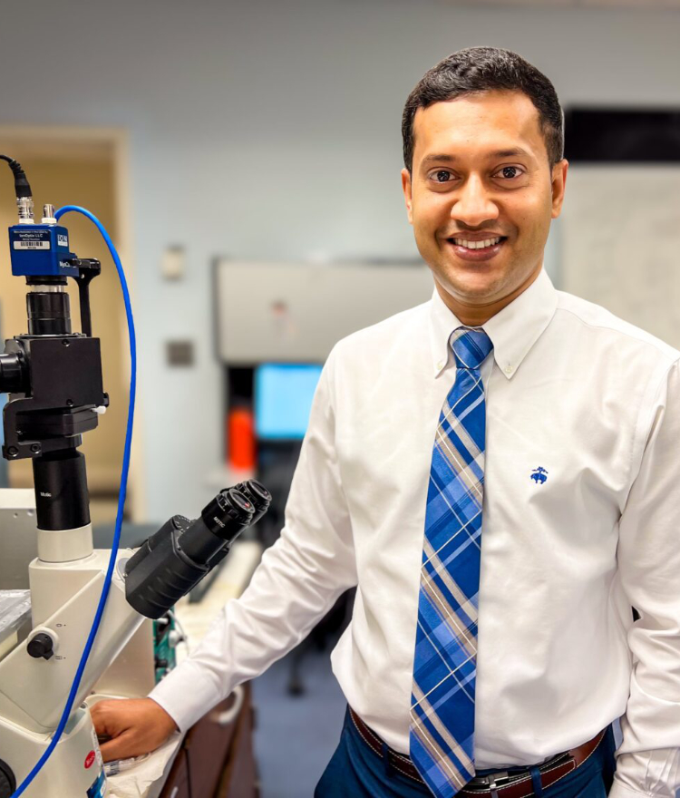 Dr. Raquibul Hasan in a laboratory.