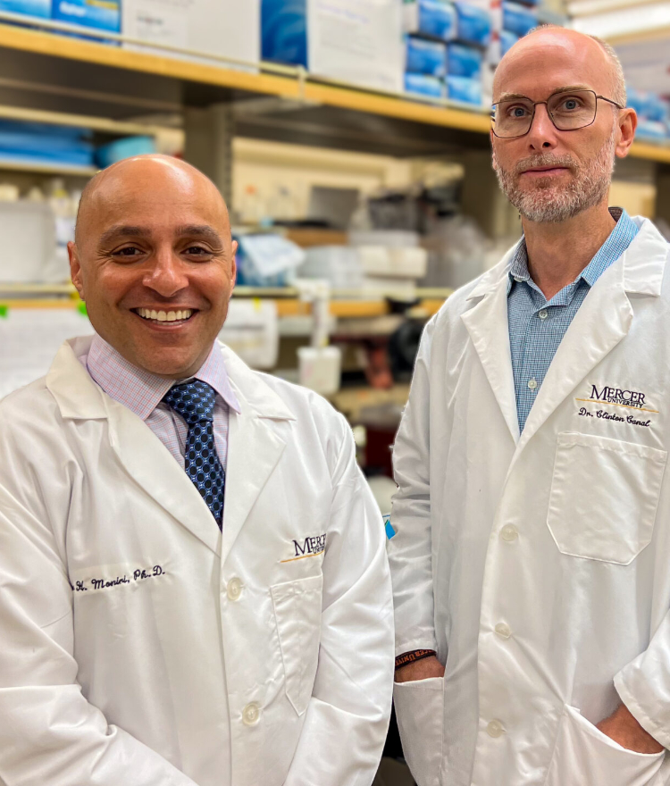 Dr. Nader Moniri and Dr. Clinton Canal from the Mercer College of Pharmacy in a research lab.